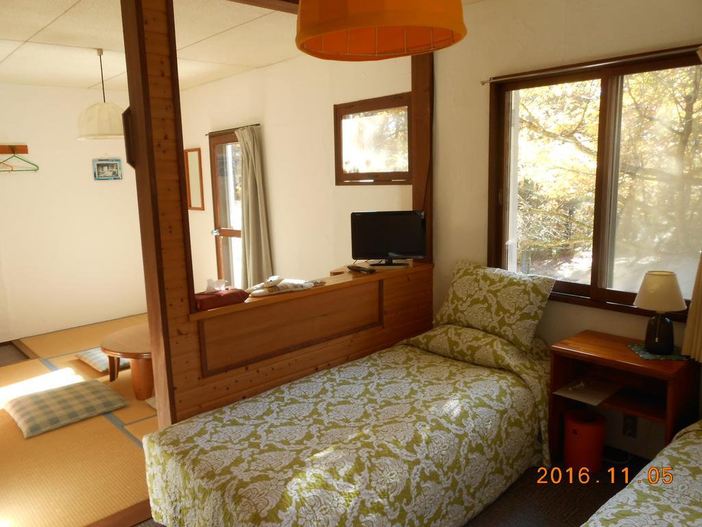 Pension Nugget Inn Hakuba Extérieur photo